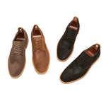 Close-up of carved detailing on men's leather brogue shoes