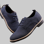 Men's suede-style casual sneakers in a classic low-top design